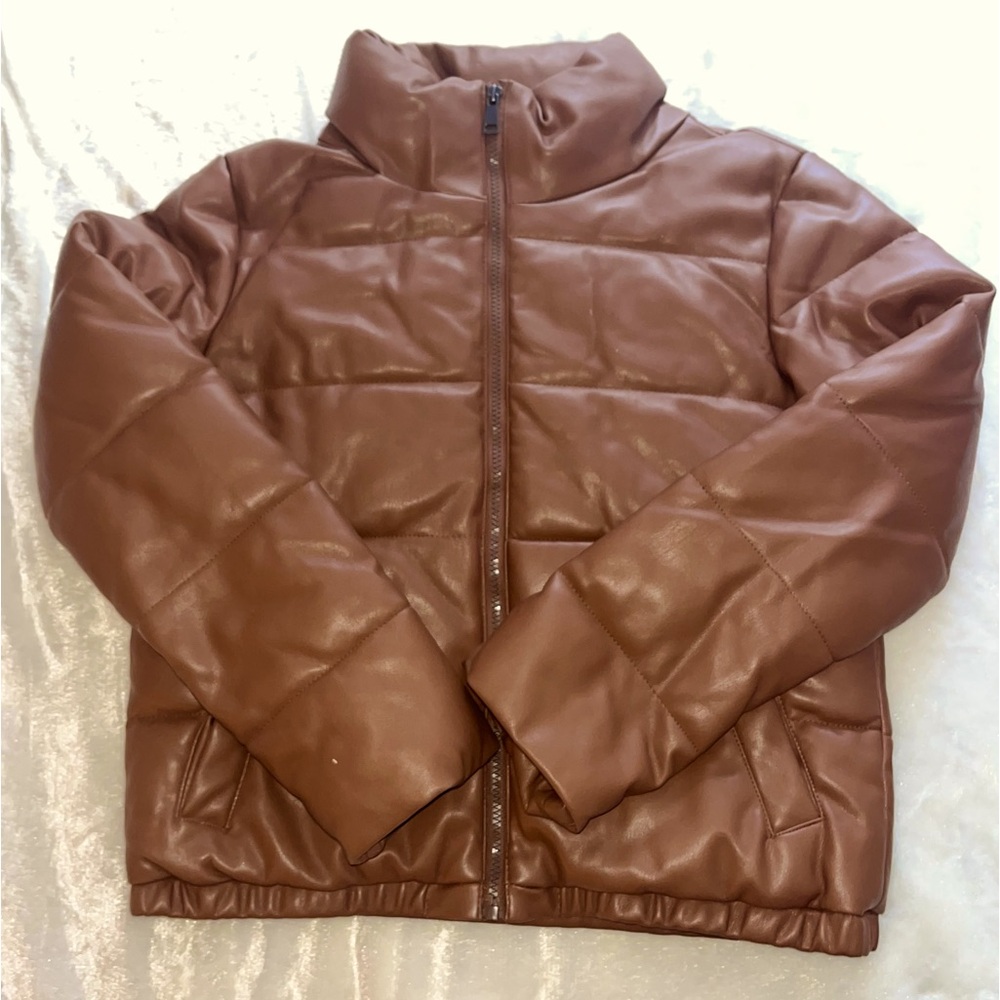 Brown coat to keep you warm in the winter while staying stylish.
